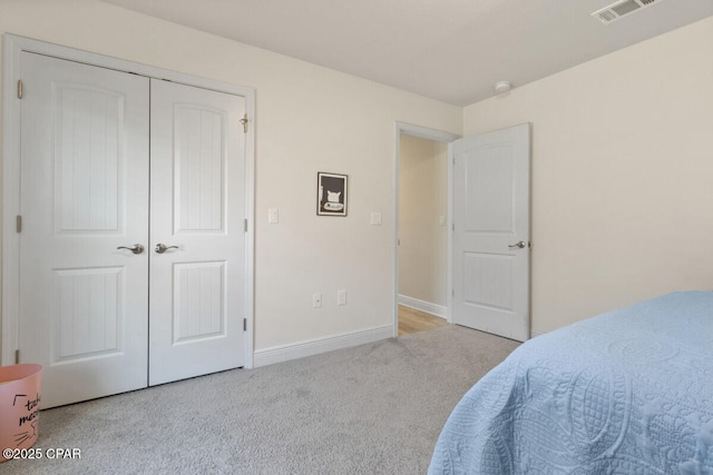 4717 Maegans Ridge Rd, Panama City, FL 32404 - bedroom featuring carpet flooring, baseboards, a closet, and visible vents