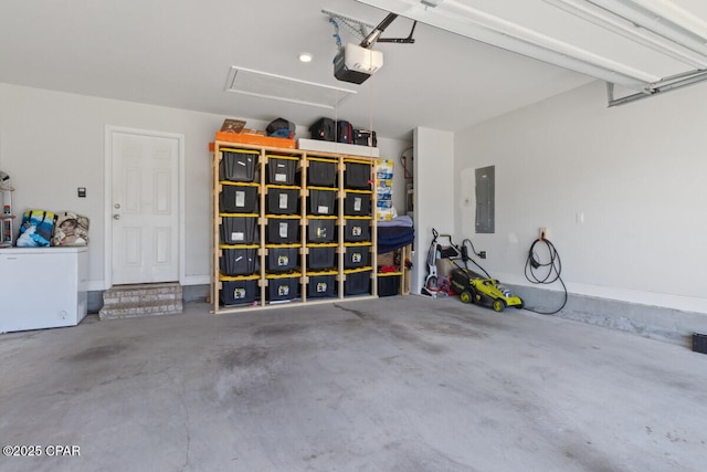 4717 Maegans Ridge Rd, Panama City, FL 32404 - garage featuring electric panel and a garage door opener