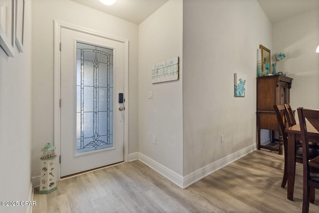 4717 Maegans Ridge Rd, Panama City, FL 32404 - foyer entrance featuring baseboards and wood finished floors