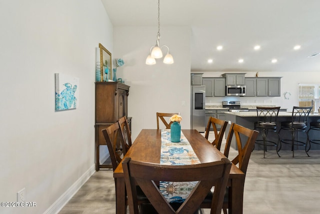 4717 Maegans Ridge Rd, Panama City, FL 32404 - dining room featuring light wood-style flooring, visible vents, baseboards, a chandelier, and recessed lighting