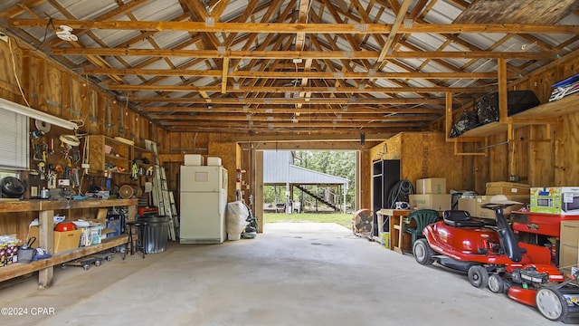 garage featuring freestanding refrigerator