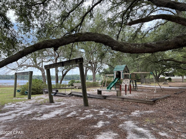communal playground with a water view