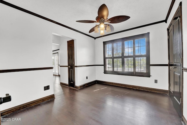 8508 S Holland Rd, Southport, FL 32409 - spare room with wood finished floors, a textured ceiling, crown molding, ceiling fan, and baseboards