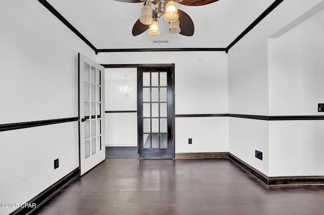 8508 S Holland Rd, Southport, FL 32409 - spare room with french doors, ornamental molding, ceiling fan, a chandelier, and baseboards