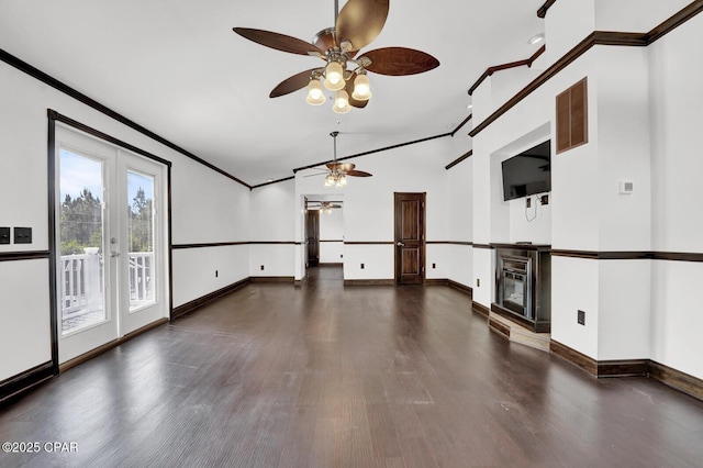 8508 S Holland Rd, Southport, FL 32409 - unfurnished living room featuring a ceiling fan, ornamental molding, wood finished floors, baseboards, and french doors
