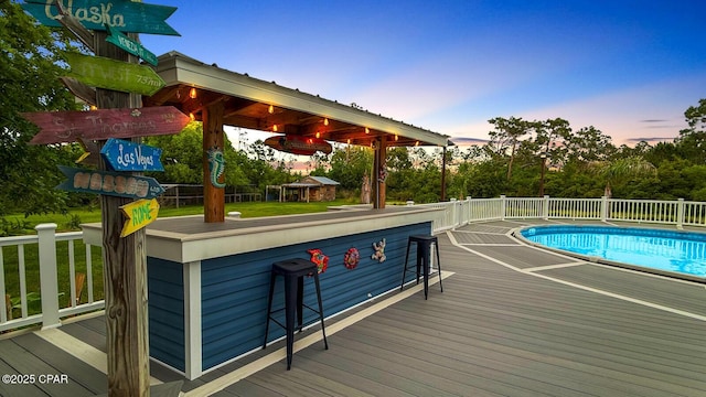 8508 S Holland Rd, Southport, FL 32409 - deck at dusk featuring a gazebo