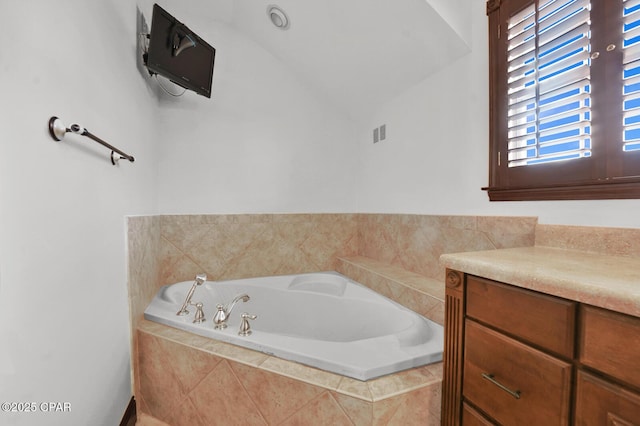 8508 S Holland Rd, Southport, FL 32409 - full bath with a bath and lofted ceiling