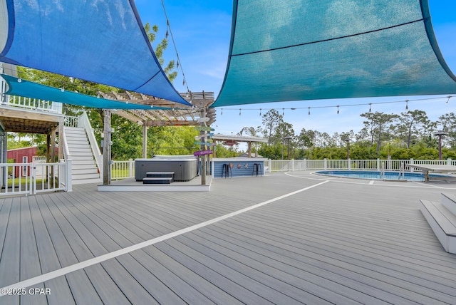 8508 S Holland Rd, Southport, FL 32409 - deck featuring a hot tub and stairs