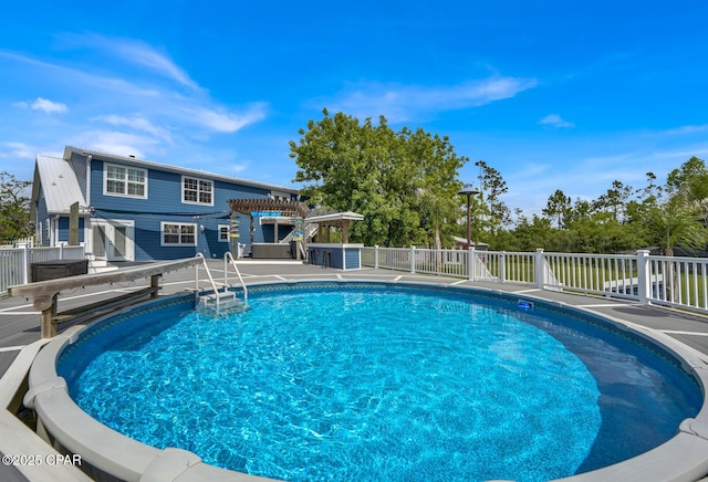 8508 S Holland Rd, Southport, FL 32409 - swimming pool featuring a pergola and a wooden deck