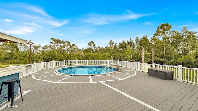 8508 S Holland Rd, Southport, FL 32409 - view of pool with a deck and view of scattered trees