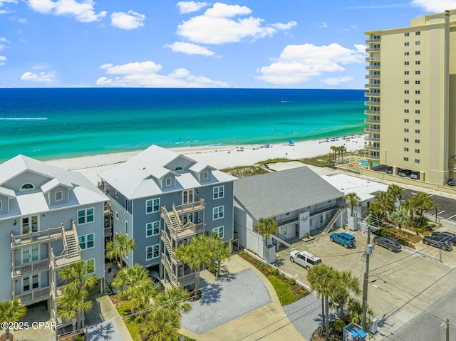 aerial view of waterfront with a beach