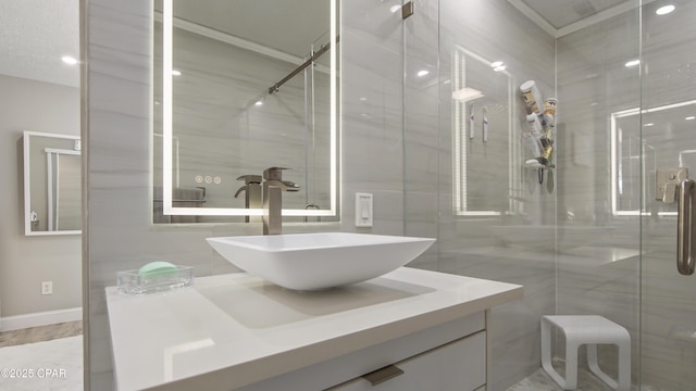 722 E Pine Forest Dr, Lynn Haven, FL 32444 - full bathroom with vanity, tile walls, and a shower stall