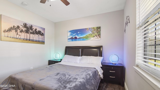 722 E Pine Forest Dr, Lynn Haven, FL 32444 - bedroom featuring dark wood-style floors, baseboards, and ceiling fan
