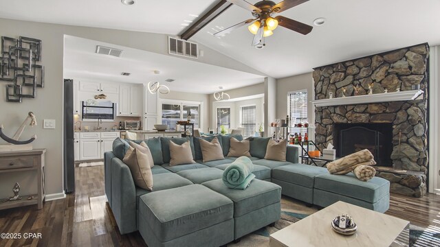 722 E Pine Forest Dr, Lynn Haven, FL 32444 - living room with a ceiling fan, dark wood finished floors, a fireplace, and baseboards