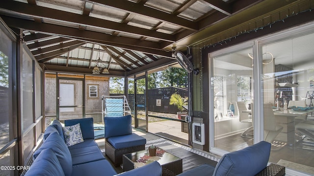 722 E Pine Forest Dr, Lynn Haven, FL 32444 - sunroom featuring an outdoor living space, lofted ceiling, and healthy amount of natural light