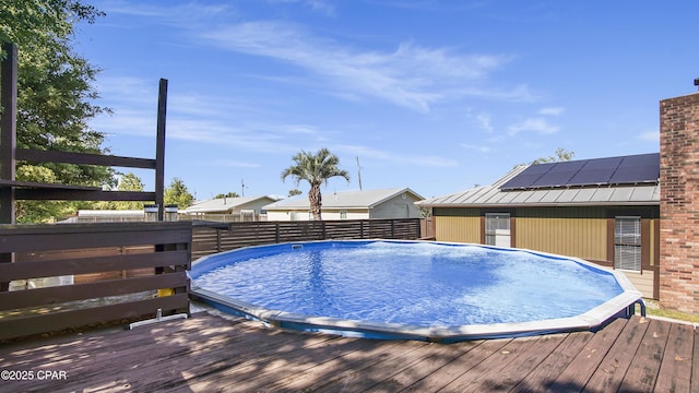 722 E Pine Forest Dr, Lynn Haven, FL 32444 - view of swimming pool featuring a wooden deck