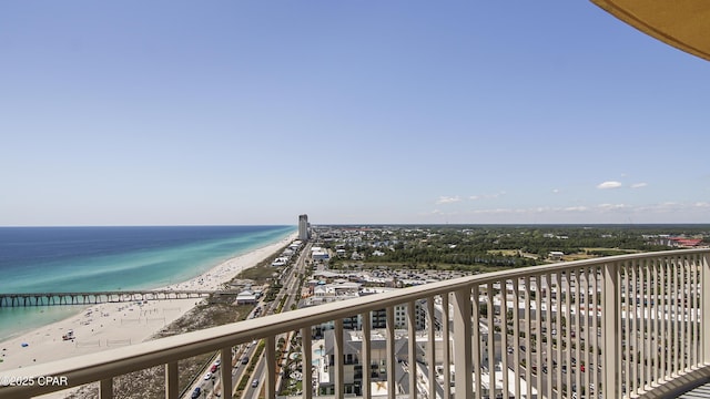 balcony featuring view of water and beach