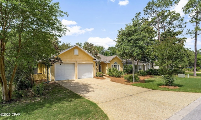 view of front of home with a garage, driveway, stucco siding, and a front yard