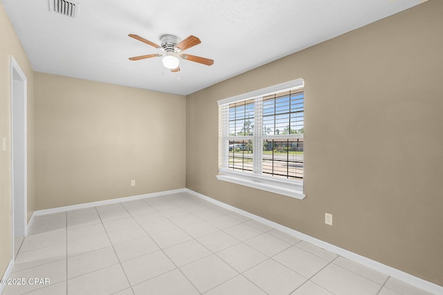 7936 Betty Louise Dr, Panama City, FL 32404 - spare room with a ceiling fan, baseboards, and light tile patterned flooring