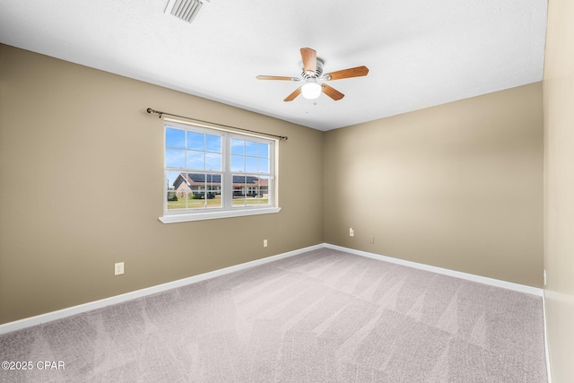 7936 Betty Louise Dr, Panama City, FL 32404 - spare room featuring ceiling fan, light colored carpet, and baseboards