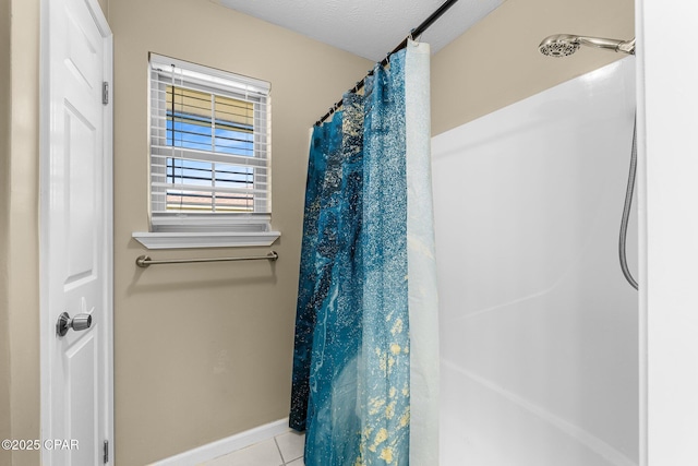 7936 Betty Louise Dr, Panama City, FL 32404 - full bathroom with tile patterned flooring, baseboards, and a shower with shower curtain