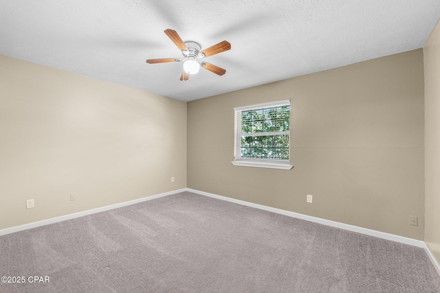 7936 Betty Louise Dr, Panama City, FL 32404 - spare room featuring a ceiling fan, baseboards, carpet, and a textured ceiling