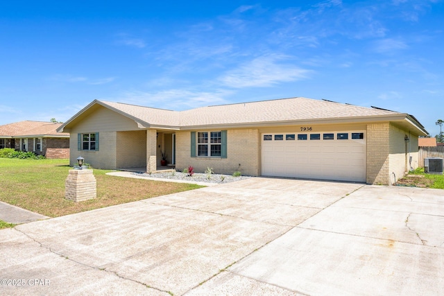 7936 Betty Louise Dr, Panama City, FL 32404 - ranch-style house with brick siding, a garage, concrete driveway, and a front lawn