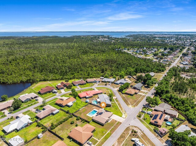 7936 Betty Louise Dr, Panama City, FL 32404 - aerial view of property and surrounding area with a nearby body of water, nearby suburban area, and a heavily wooded area