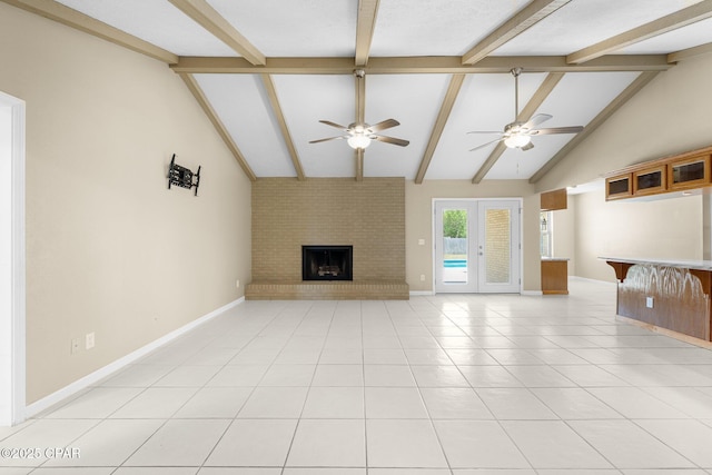 7936 Betty Louise Dr, Panama City, FL 32404 - unfurnished living room with ceiling fan, a fireplace, baseboards, beam ceiling, and light tile patterned floors