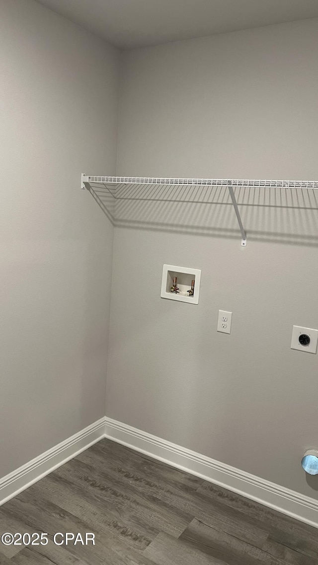 11438 Palm Breeze St, Panama City, FL 32404 - laundry room featuring dark wood-type flooring, hookup for an electric dryer, baseboards, and hookup for a washing machine