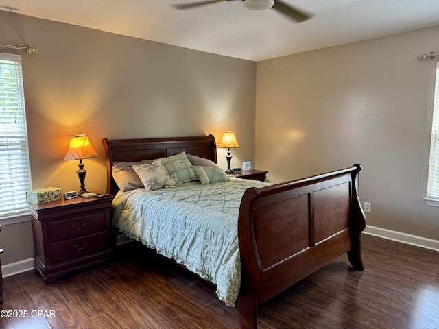 bedroom with wood finished floors, baseboards, and a ceiling fan