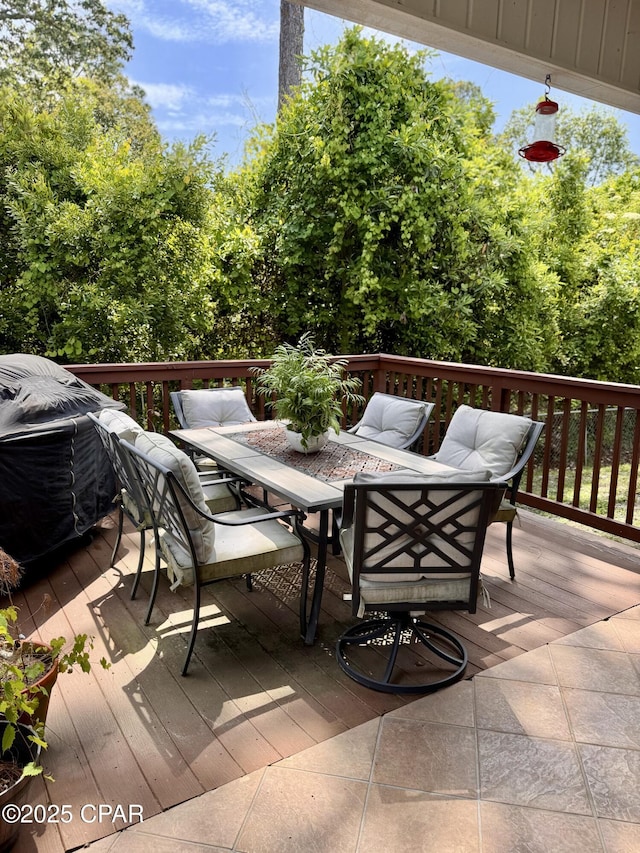 deck featuring outdoor dining space