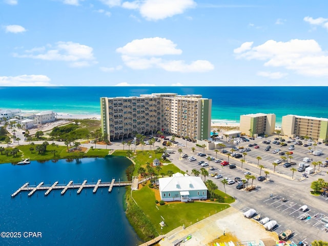 aerial view of a nearby body of water and apartment complex