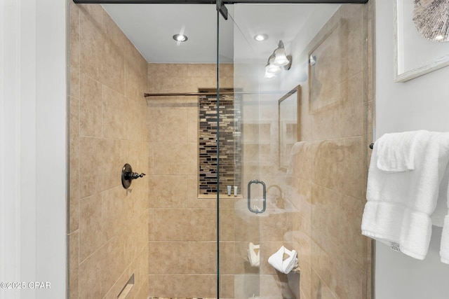 full bathroom with a shower stall and recessed lighting