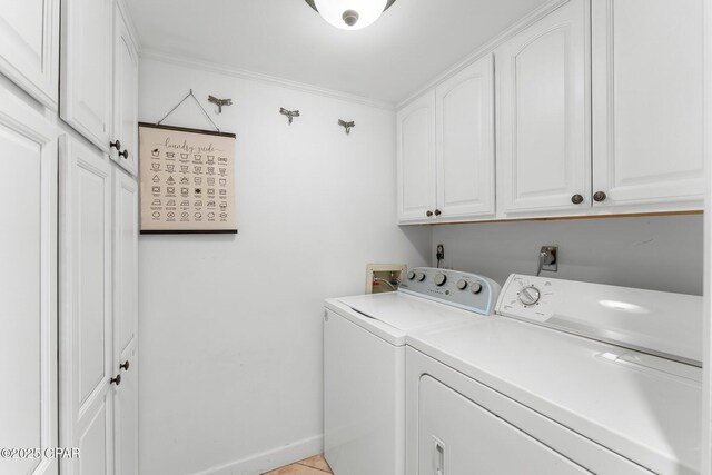 23223 Front Bch Unit A-Ph30, Panama City Beach, FL 32413 - laundry area with cabinet space, separate washer and dryer, and ornamental molding