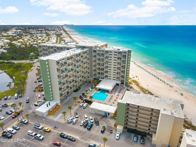 bird's eye view of extended coastline and apartment complex / building