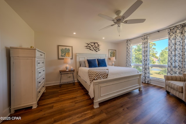 bedroom featuring recessed lighting, dark wood-style flooring, a ceiling fan, and baseboards