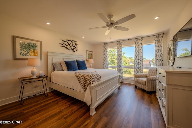 bedroom featuring dark wood finished floors, multiple windows, recessed lighting, and ceiling fan