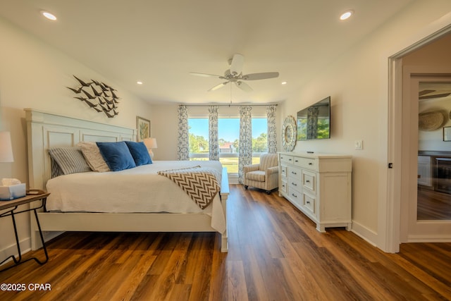 bedroom with dark wood finished floors, access to outside, recessed lighting, a ceiling fan, and baseboards