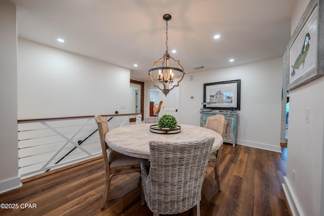 dining room featuring dark wood-style flooring, recessed lighting, a chandelier, and baseboards