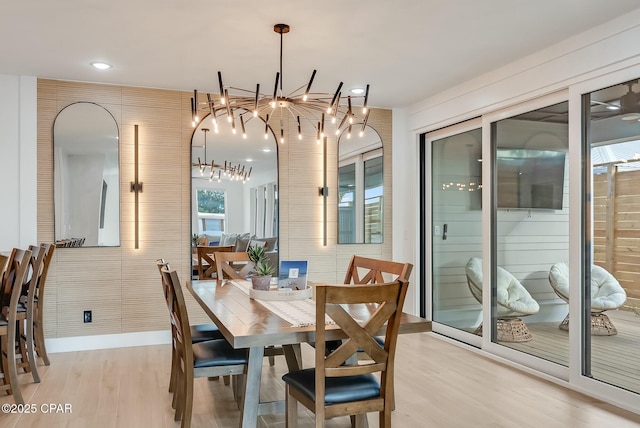 208 George C Wallace, Panama City Beach, FL 32413 - dining space with a chandelier, light wood-type flooring, and recessed lighting
