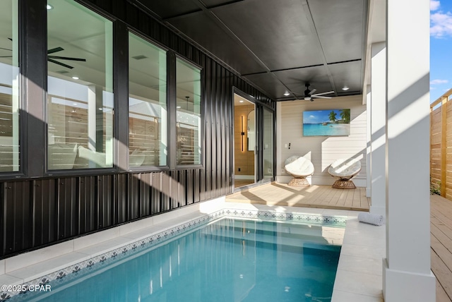 208 George C Wallace, Panama City Beach, FL 32413 - swimming pool featuring a ceiling fan and a wooden deck