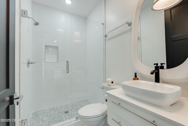 208 George C Wallace, Panama City Beach, FL 32413 - bathroom featuring a shower stall, toilet, vanity, and recessed lighting