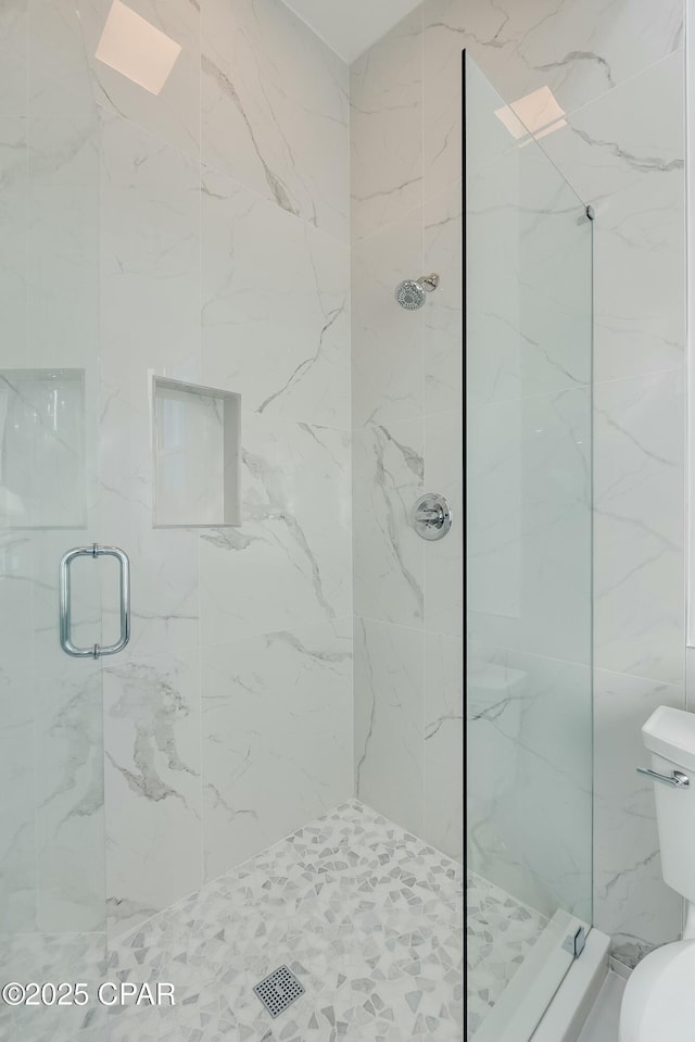 208 George C Wallace, Panama City Beach, FL 32413 - full bath with a marble finish shower and toilet