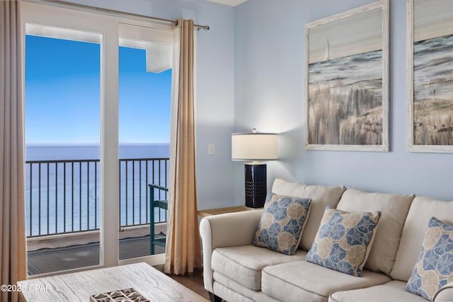 9860 S Thomas Dr Unit 1824, Panama City Beach, FL 32408 - living room featuring a water view and wood finished floors