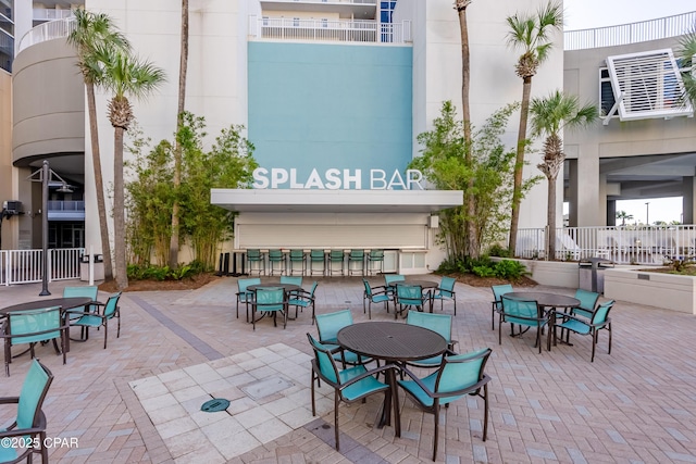 9860 S Thomas Dr Unit 1824, Panama City Beach, FL 32408 - view of patio / terrace featuring outdoor dining area