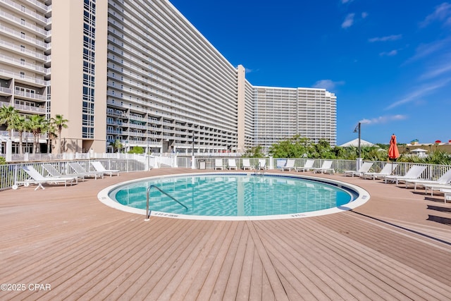 9860 S Thomas Dr Unit 1824, Panama City Beach, FL 32408 - community pool featuring a deck