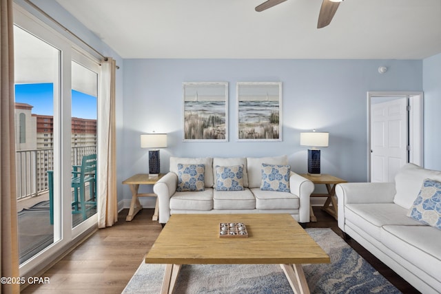 9860 S Thomas Dr Unit 1824, Panama City Beach, FL 32408 - living room with wood finished floors and a ceiling fan