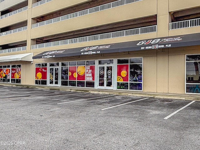 9860 S Thomas Dr Unit 1824, Panama City Beach, FL 32408 - view of commercial property with a parking lot