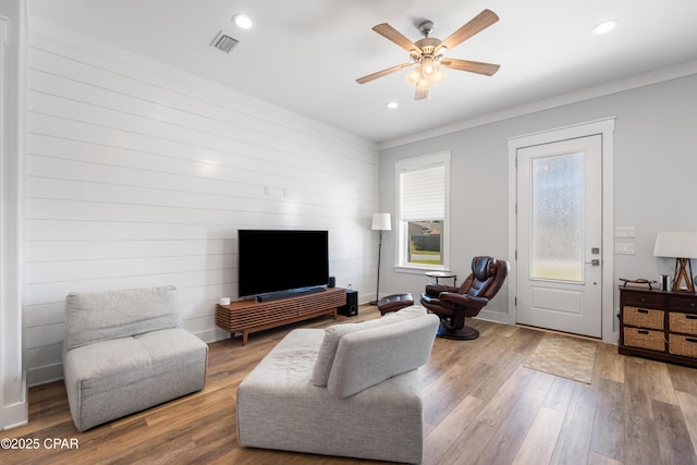 111 George C Wallace Blvd, Panama City Beach, FL 32413 - living room featuring wood finished floors, a ceiling fan, recessed lighting, and crown molding